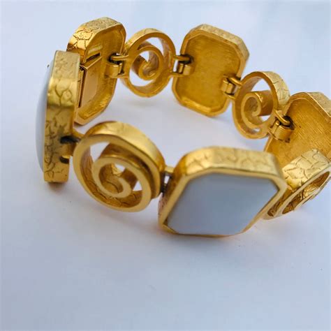 givenchy gold earrings vintage|vintage givenchy bracelet.